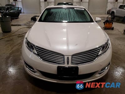 Piąte zdjęcie samochodu w środku: 2015 LINCOLN MKZ VIN:3LN6L2J90FR620572 - miniatura