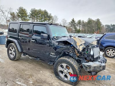 Czwarte zdjęcie samochodu z boku: 2016 JEEP WRANGLER UNLIMITED SAHARA VIN:1C4BJWEG9GL347155 - miniatura