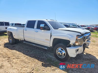 Czwarte zdjęcie samochodu z boku: 2017 CHEVROLET SILVERADO K3500 HIGH COUNTRY VIN:1GC4K1EY4HF249670 - miniatura