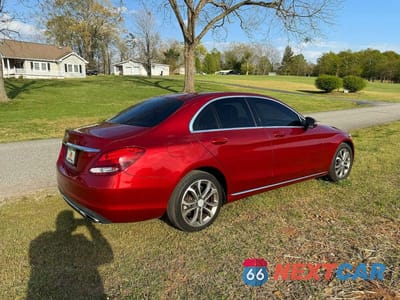 Czwarte zdjęcie samochodu z boku: 2016 MERCEDES-BENZ C 300 VIN:55SWF4JB9GU111608 - miniatura