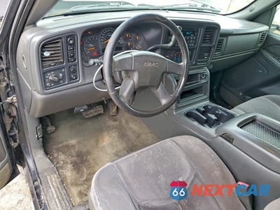 Zdjęcie 8 z 11 samochodu: 2003 GMC NEW SIERRA K1500 VIN:1GTEK19T13E325671 - miniatura