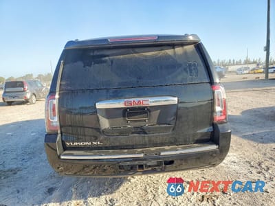 Zdjęcie 6 z 14 samochodu: 2015 GMC YUKON XL DENALI VIN:1GKS1JKJ5FR143665 - miniatura