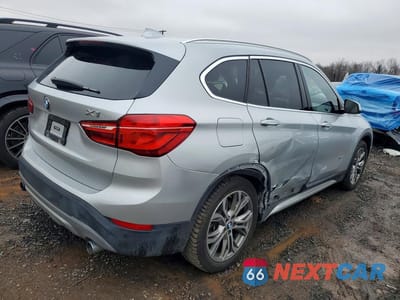 Trzecie zdjęcie samochodu z tyłu: 2016 BMW X1 XDRIVE28I VIN:WBXHT3Z3XG4A51717 - miniatura