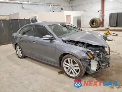 Czwarte zdjęcie samochodu z boku: 2016 VOLKSWAGEN JETTA SEL VIN:3VWL07AJXGM341150 - miniatura
