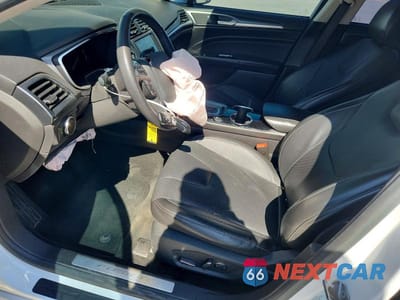 Zdjęcie 7 z 12 samochodu: 2016 FORD FUSION TITANIUM PHEV VIN:3FA6P0SU7GR106824 - miniatura