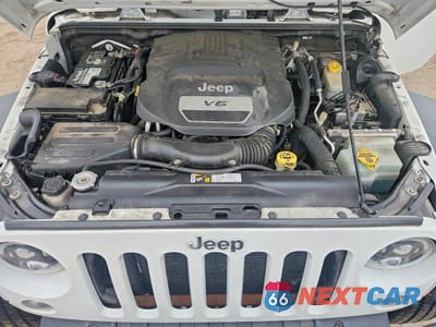 Zdjęcie 12 z 13 samochodu: 2015 JEEP WRANGLER UNLIMITED SPORT VIN:1C4BJWDG9FL768938 - miniatura