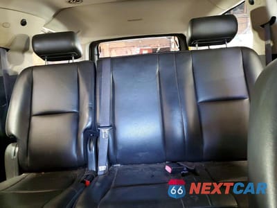 Zdjęcie 10 z 13 samochodu: 2010 CHEVROLET SUBURBAN C1500 LS VIN:1GNUCHE07AR100830 - miniatura