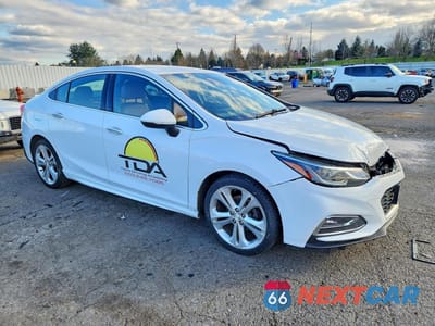 Czwarte zdjęcie samochodu z boku: 2017 CHEVROLET CRUZE PREMIER VIN:1G1BF5SM3H7211466 - miniatura