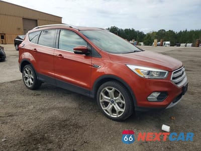Czwarte zdjęcie samochodu z boku: 2019 FORD ESCAPE TITANIUM VIN:1FMCU9J95KUB01321 - miniatura