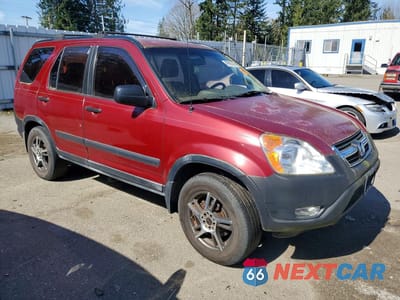 Czwarte zdjęcie samochodu z boku: 2002 HONDA CR-V LX VIN:JHLRD684X2C020184 - miniatura