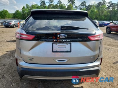 Zdjęcie 6 z 12 samochodu: 2022 FORD EDGE SEL VIN:2FMPK4J97NBA31874 - miniatura