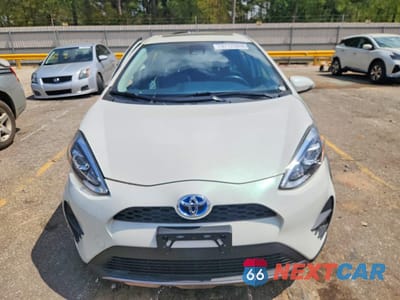 Piąte zdjęcie samochodu w środku: 2018 TOYOTA PRIUS C FOUR VIN:JTDKDTB38J1608074 - miniatura