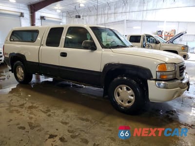 Czwarte zdjęcie samochodu z boku: 2003 GMC NEW SIERRA K1500 VIN:1GTEK19T33E288915 - miniatura