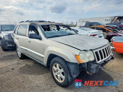 Czwarte zdjęcie samochodu z boku: 2009 JEEP GRAND CHEROKEE LAREDO VIN:1J8GR48K49C525911 - miniatura