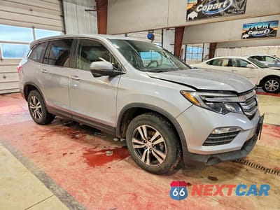 Czwarte zdjęcie samochodu z boku: 2018 HONDA PILOT EX VIN:5FNYF6H30JB036874 - miniatura