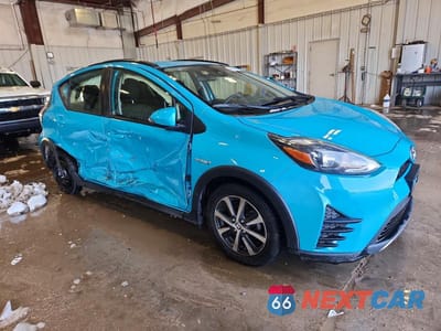 Czwarte zdjęcie samochodu z boku: 2018 TOYOTA PRIUS C TWO VIN:JTDKDTB37J1619986 - miniatura