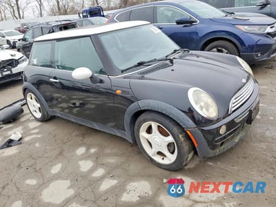 Czwarte zdjęcie samochodu z boku: 2003 MINI COOPER VIN:WMWRC33403TC39761 - miniatura