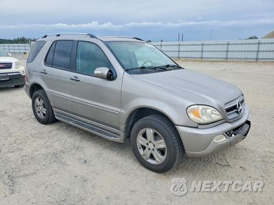 Czwarte zdjęcie samochodu z boku: 2005 MERCEDES-BENZ ML 500 VIN:4JGAB75E05A568371 - miniatura