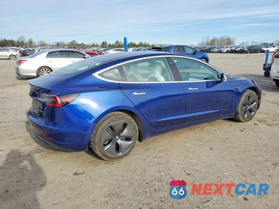 Trzecie zdjęcie samochodu z tyłu: 2018 TESLA MODEL 3 VIN:5YJ3E1EB5JF096502 - miniatura