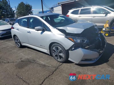 Czwarte zdjęcie samochodu z boku: 2018 NISSAN LEAF S VIN:1N4AZ1CP7JC300598 - miniatura