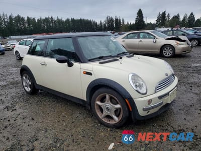 Czwarte zdjęcie samochodu z boku: 2003 MINI COOPER VIN:WMWRC33413TE18200 - miniatura