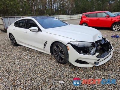 Czwarte zdjęcie samochodu z boku: 2023 BMW 840I VIN:WBAGV2C01PCL65624 - miniatura