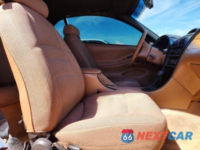 Zdjęcie 10 z 12 samochodu: 1997 FORD MUSTANG VIN:1FALP444XVF201105 - miniatura