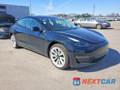 Czwarte zdjęcie samochodu z boku: 2023 TESLA MODEL 3 VIN:5YJ3E1EA3PF429702 - miniatura