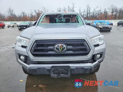Piąte zdjęcie samochodu w środku: 2020 TOYOTA TACOMA VIN:3TMDZ5BN0LM083928 - miniatura