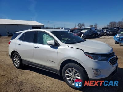 Czwarte zdjęcie samochodu z boku: 2018 CHEVROLET EQUINOX LT VIN:2GNAXSEV7J6304538 - miniatura