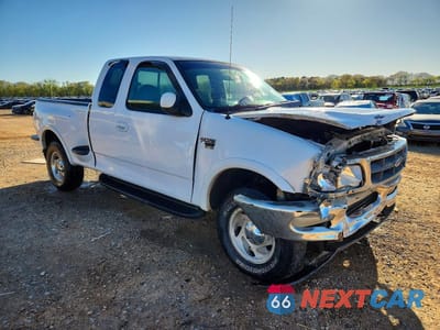 Czwarte zdjęcie samochodu z boku: 1998 FORD F150 VIN:1FTZX08W2WKA20176 - miniatura