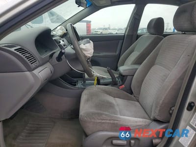 Zdjęcie 7 z 11 samochodu: 2002 TOYOTA CAMRY LE VIN:JTDBE32K420105377 - miniatura