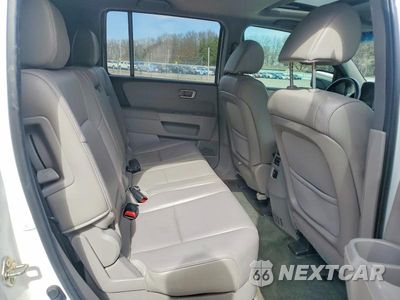 Zdjęcie 10 z 13 samochodu: 2014 HONDA PILOT EXL VIN:5FNYF4H5XEB010536 - miniatura