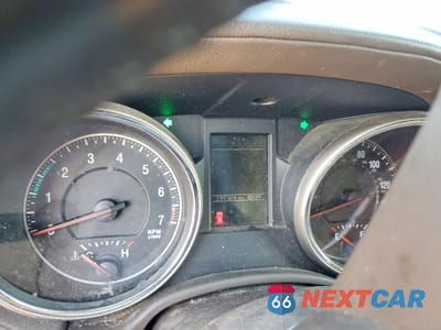 Zdjęcie 9 z 13 samochodu: 2013 JEEP GRAND CHEROKEE OVERLAND VIN:1C4RJECG9DC526108 - miniatura