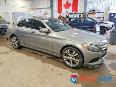 Czwarte zdjęcie samochodu z boku: 2016 MERCEDES-BENZ C 300 4MATIC VIN:55SWF4KB8GU159146 - miniatura