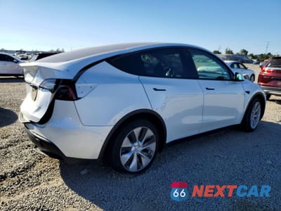 Trzecie zdjęcie samochodu z tyłu: 2022 TESLA MODEL Y VIN:7SAYGDEE8NF435497 - miniatura