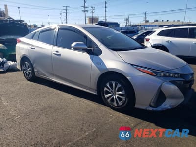 Czwarte zdjęcie samochodu z boku: 2021 TOYOTA PRIUS PRIME XLE VIN:JTDKAMFP8M3183816 - miniatura