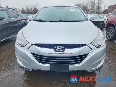 Piąte zdjęcie samochodu w środku: 2011 HYUNDAI TUCSON LIMITED VIN:KM8JU3AC6BU259571 - miniatura