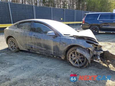 Czwarte zdjęcie samochodu z boku: 2021 TESLA MODEL 3 VIN:5YJ3E1EB5MF019570 - miniatura