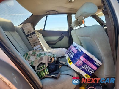 Zdjęcie 10 z 13 samochodu: 1993 TOYOTA CAMRY LE VIN:4T1SK12E2PU195678 - miniatura