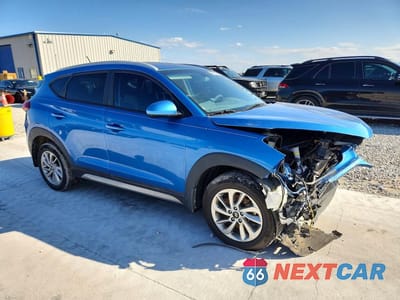 Czwarte zdjęcie samochodu z boku: 2017 HYUNDAI TUCSON SE VIN:KM8J33A44HU294064 - miniatura