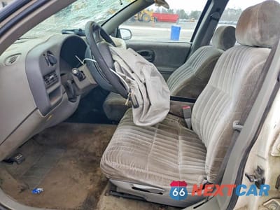 Zdjęcie 7 z 11 samochodu: 2001 CHEVROLET LUMINA VIN:2G1WL52J611130724 - miniatura
