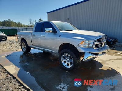 Czwarte zdjęcie samochodu z boku: 2014 RAM 1500 SLT VIN:1C6RR6GG5ES456954 - miniatura