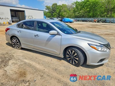 Czwarte zdjęcie samochodu z boku: 2016 NISSAN ALTIMA 2.5 SL VIN:1N4AL3AP0GC157826 - miniatura
