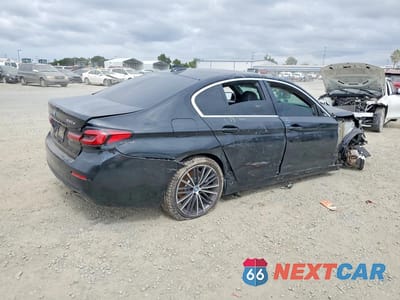 Trzecie zdjęcie samochodu z tyłu: 2022 BMW 530E VIN:WBA13AG07NCK52211 - miniatura