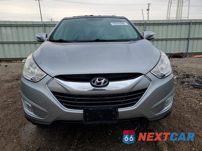 Piąte zdjęcie samochodu w środku: 2011 HYUNDAI TUCSON LIMITED VIN:KM8JU3ACXBU261498 - miniatura