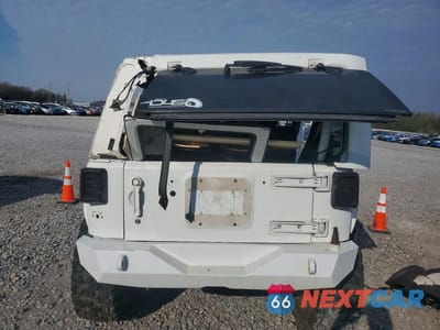 Zdjęcie 6 z 12 samochodu: 2012 JEEP WRANGLER UNLIMITED SAHARA VIN:1C4HJWEG5CL113762 - miniatura