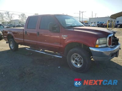 Czwarte zdjęcie samochodu z boku: 2002 FORD F250 SUPER DUTY VIN:1FTNW21F72EB49675 - miniatura