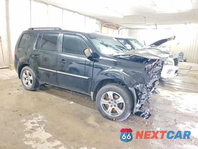 Czwarte zdjęcie samochodu z boku: 2009 HONDA PILOT TOURING VIN:5FNYF48929B029784 - miniatura
