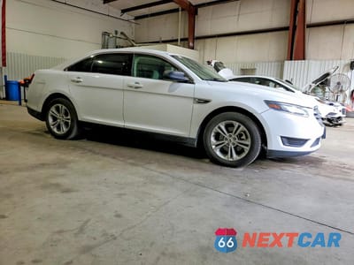 Czwarte zdjęcie samochodu z boku: 2018 FORD TAURUS VIN:1FAHP2D89JG141268 - miniatura